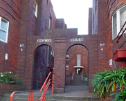 , The motif of curves is continued with arches, railings and awnings in 'Conway Court'. Photograph by Ian Hoskins, 2015